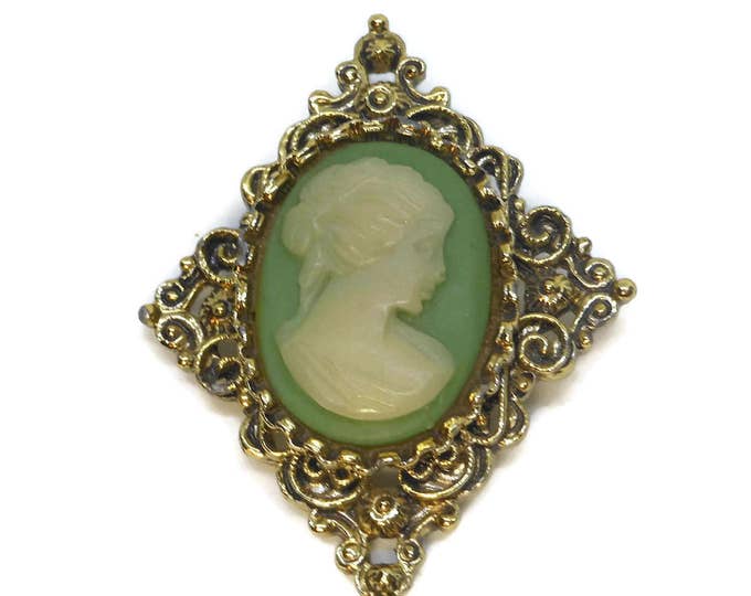 Gerry's cameo brooch, antiqued gold filigree diamond shape with oval cream lucite cameo on mint green field