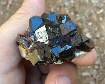 Andradite Garnet Cluster on matrix