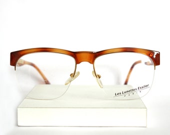 Les Lunettes Essilor Paris Polyamide and gold metal Eyeglasses
