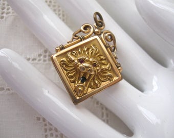 Antique Art Nouveau Repousse Roaring Lion with Red Rhinestone Eyes. 14K Gold Filled Locket Pendant, W&H (Wightman Hough) Collectible Locket