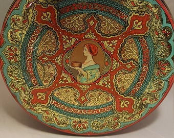 Art Nouveau large round tin.