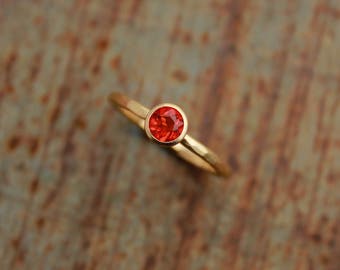 18k gold ring with fire opal