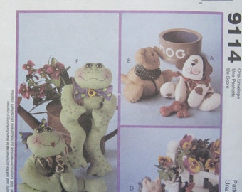McCall's 9114. Bean Bag Pal Designs -- Pattern pieces and instructions to make bean bag animals, all with bow or scarf trims. Uncut.