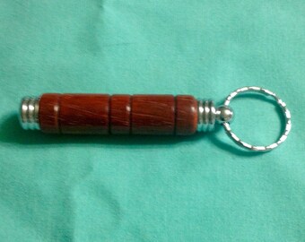 Key chain, secret compartment