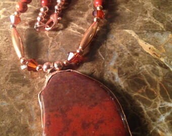 Red Jasper and fire agate on copper