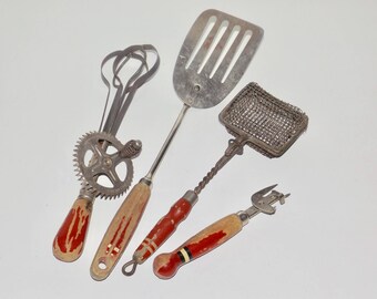 Red wood handle kitchen utensils,set of 4,red chipped paint handles,A & J egg beater,slotted spatula,bottle opener,mesh strainer,wire basket