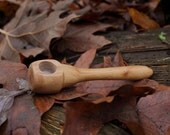 Solid plum smoking pipe