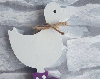 Cute small duck wearing wellies
