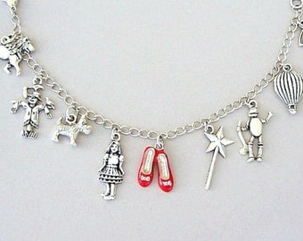 Wizard of Oz bracelet, Wizard of Oz charm bracelet, ruby slippers charm, Dorothy, Toto, cowardly lion, scarecrow, tin man, rainbow, movie