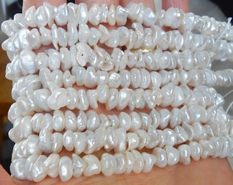 White , center drilled keishi freshwater pearls (7-9x3-6mm),full strand (16 inches), corn flake pearl