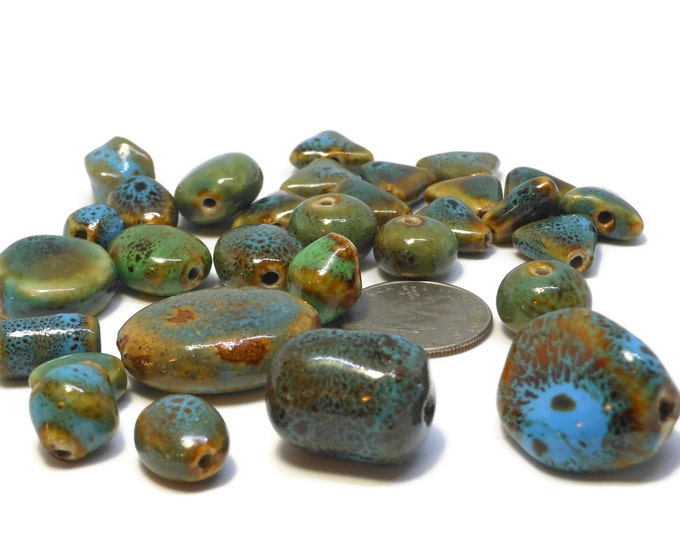 Porcelain beads, 30 bead lot, turquoise blue honey brown green, triangles ovals ball shape, 10mm X 12mm to 30mm X 22mm, great project mix