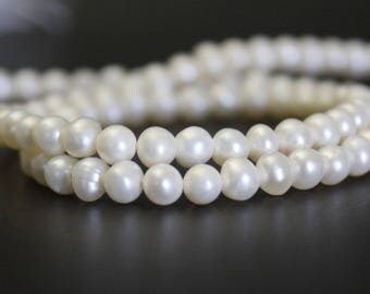 4 or 5 mm Round White Pearls on a 16 inch strand for restringing, Off Round Freshwater Pearls (# PW1014)