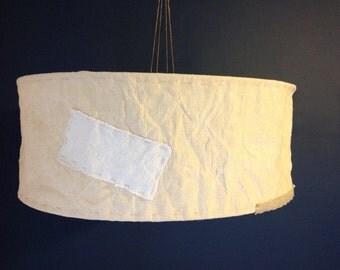 Suspension of linen and patchwork fabrics