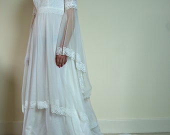 Vintage 1970s Romantic Bohemian Wedding Dress with Lace Sheer Layers in tiers and large angel sleeves Made in Great Britain