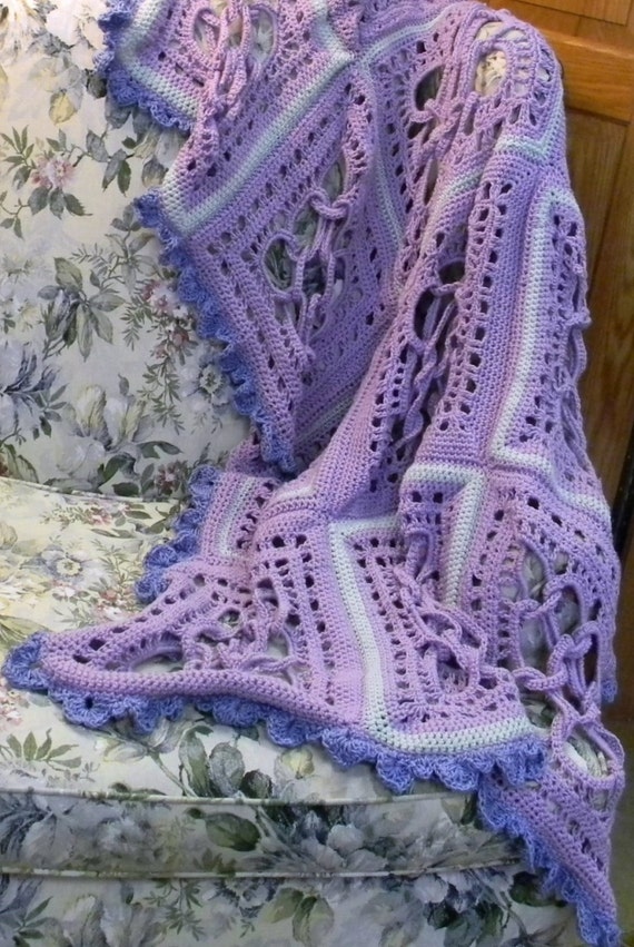 Purple motif afghan in cottonblend yarn crocheted with a