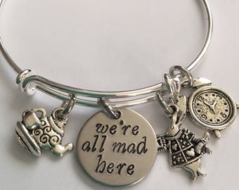 Alice in wonderland Bracelet bangle bracelet adjustable bracelet-with rabbit clock tea kettle and cup and hand stamped "we're all mad here"