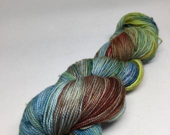 Hand dyed sock yarn in blurs and greens and some red, sock yarn for shawls, socks and more Kettle dyed yarn