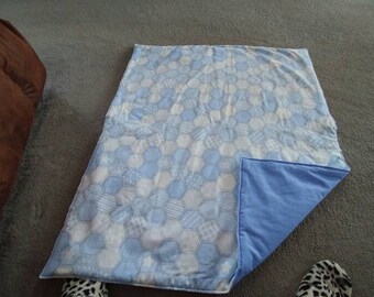 Blue octogan blanket.