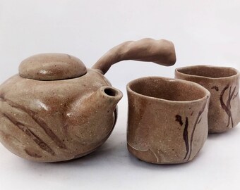 Tea pot with tow cups. Handmade ceramics. Contemporany ceramic.s. Wabi sabi