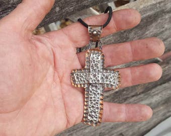 Sterling silver cross with copper back