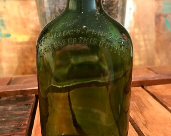 Vintage berry bros whiskey green bottle