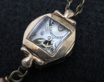 Steampunk necklace - Glimmer - Steampunk watch parts - Repurposed Art