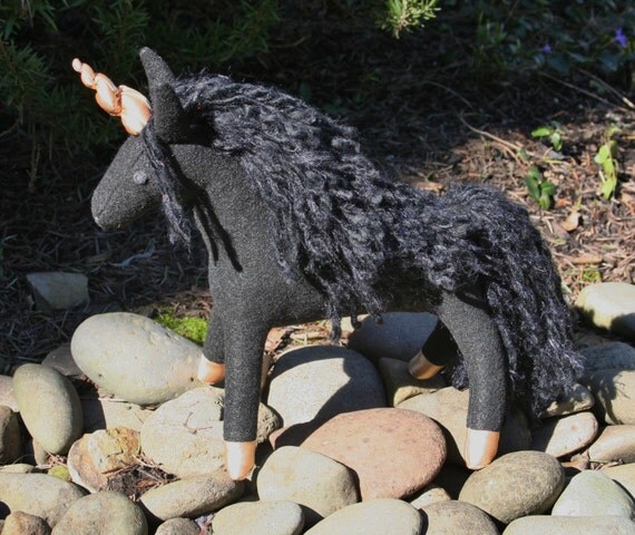 black unicorn plush toy