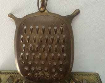 Brass turtle grater