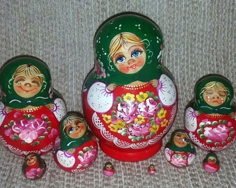 Girl in Different Moods on Nine Russian Nesting Dolls.