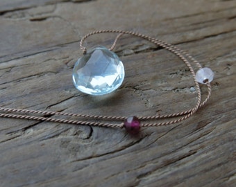 Aquamarine necklace. Everyday necklace with aquamarine briolette, garnet and moonstone beads on a thin light brown silk thread