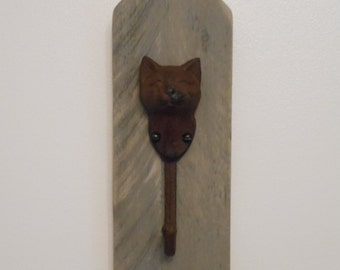 Cast Iron Cat Hook on Distressed Wood