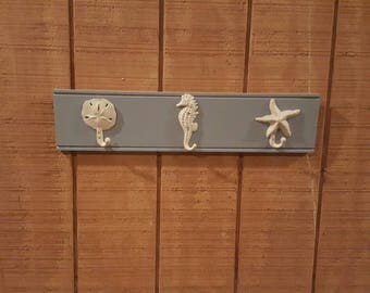 Nautical Sand Dollar Wall Hook – Beach Shore Decor, Verdigris Green Finish, Cast Iron