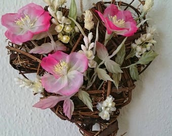 Dekoherz from grape vine with pink and white silk flowers