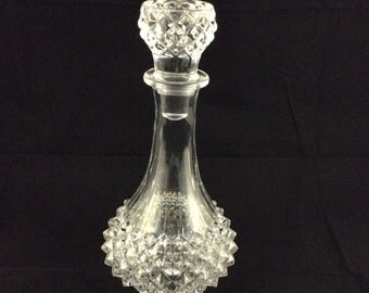Vintage crystal decanter with topper