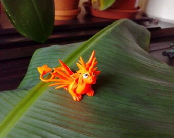 Dragon sculpture neon orange polymer clay figure