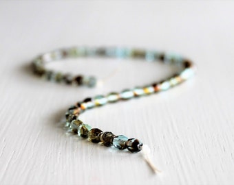 50 Aqua Tortoise Shell Faceted 4mm Czech Glass Rounds