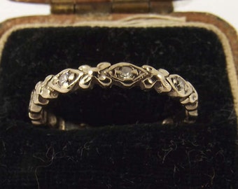 Antique white gold and diamond wedding band