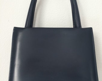 Vintage stylish darkbleu leather handbag made by the Dutch Brand Zumpolle