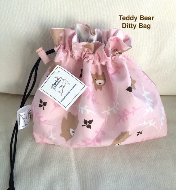 teddy bear with pouch