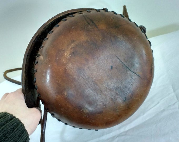 Vintage saddle leather bag, round handmade hippie shoulderbag