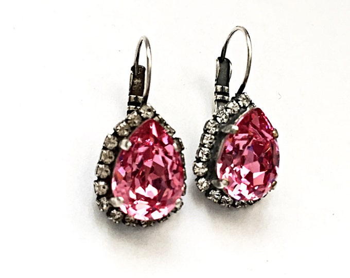 Valentine's romantic pink Swarovski crystal pear shape stone beautifully framed around a halo of sparkling pave stones for a vintage allure