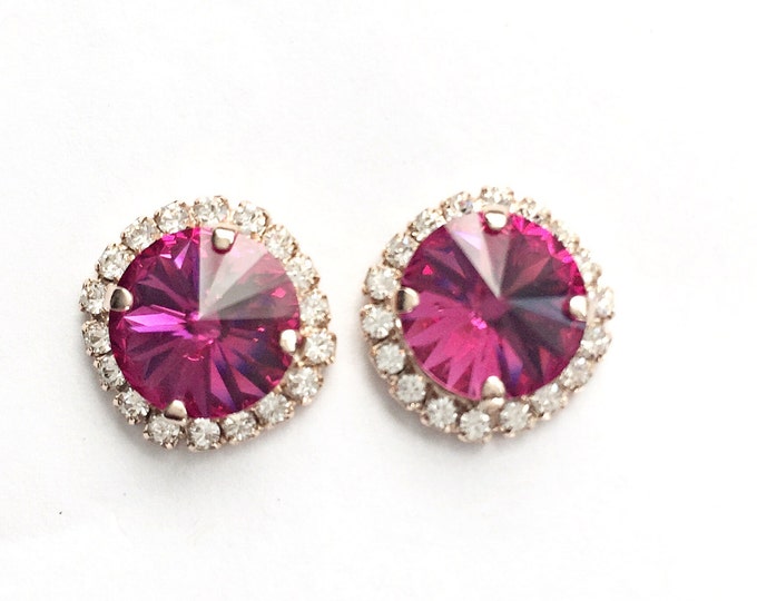 Genuine Swarovski crystal Fuchsia Classic Stud Earrings with a halo of pave stones. Swarovski pink earrings