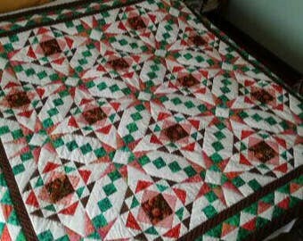 Handmade green white and pink quilted bedcover