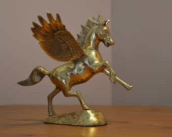 Vintage solid brass Pegasus horse figurine with blue felt bottom