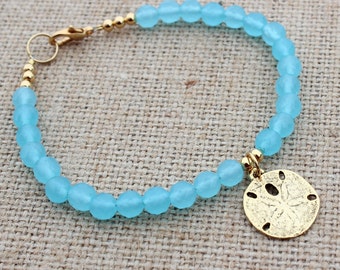 Blue Bracelet Womens with Gold Sand Dollar Charm