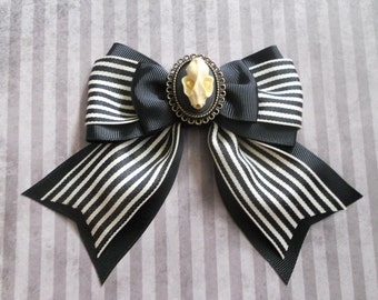 Gothic Lolita hair bow Bat skull cameo on a striped bow