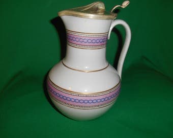 One (1), Antique, Semi-Porcelain Pitcher, with Silver Plated Cover.