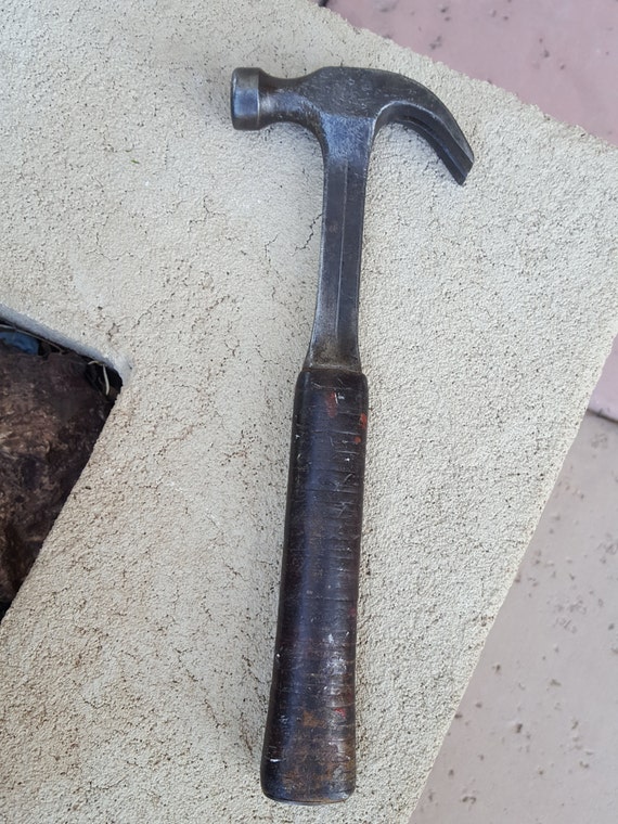 Vintage 1940s Estwing 16 oz claw hammer, stacked leather handle, one