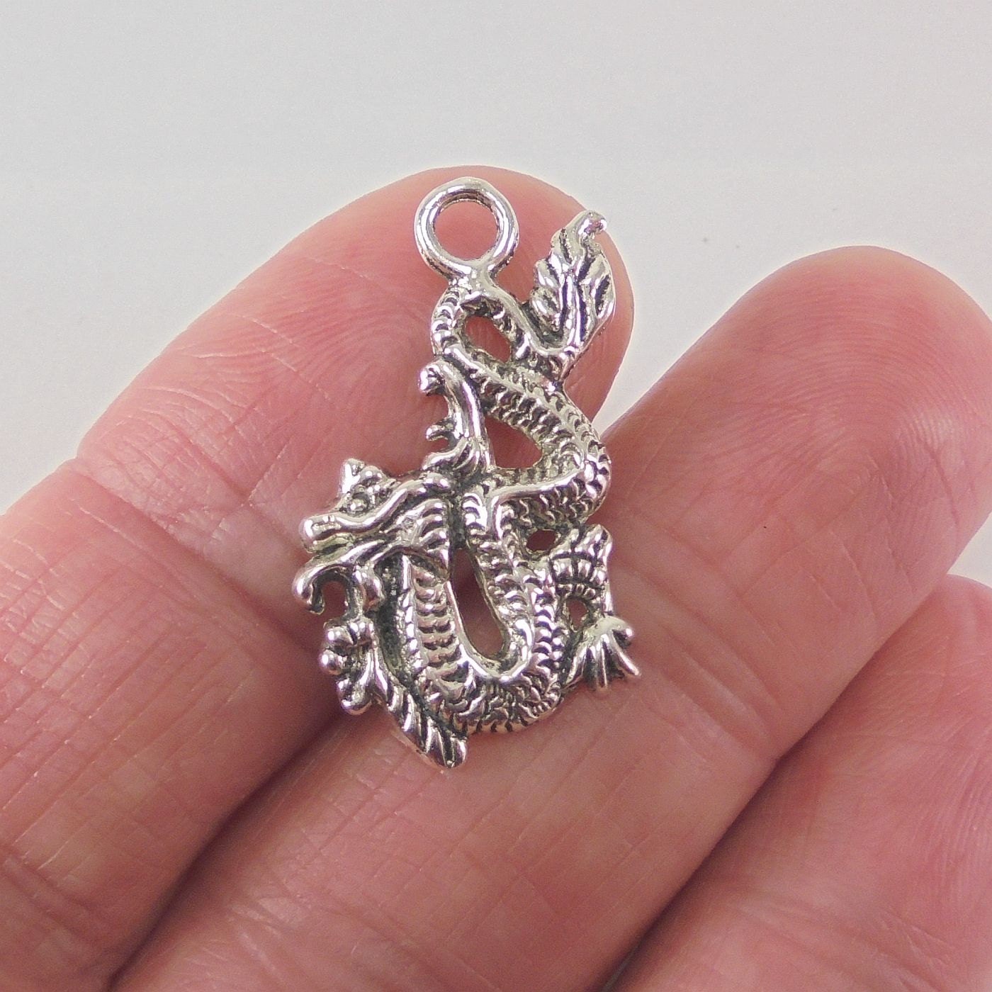 8 pc. Chinese Dragon charm 27x16mm antique silver finish