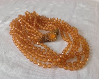 Vintage Necklace Multi Strand Resin beads.Color tan honey. 50s. Collana retro. Six strands Necklace. Gr.62